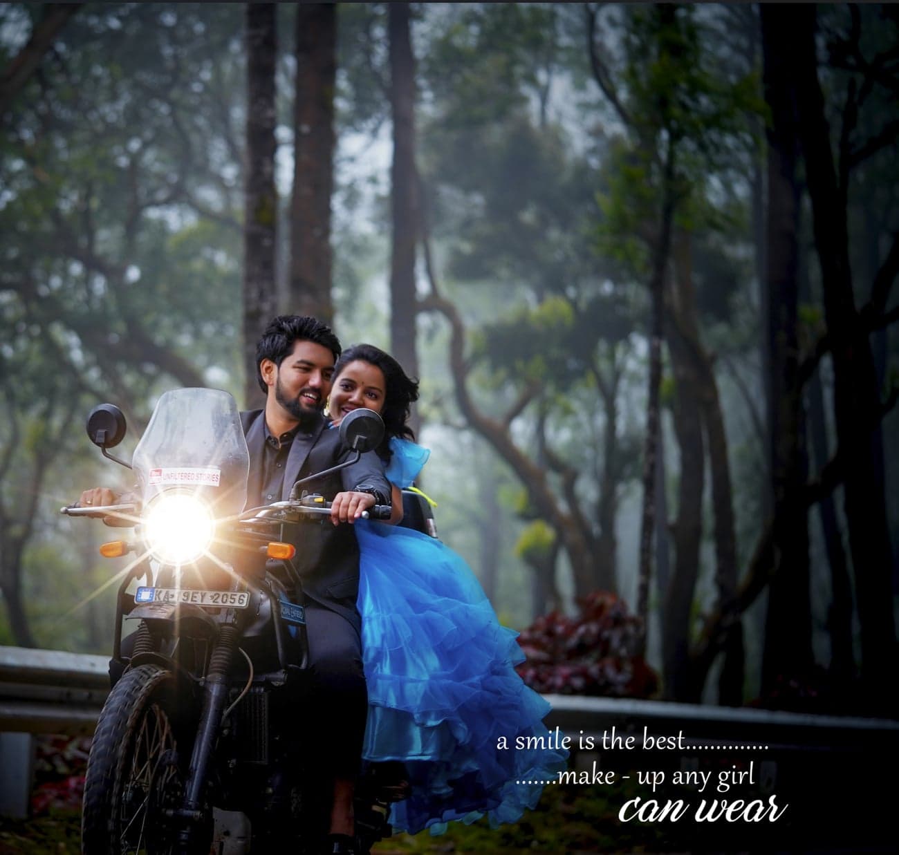 Couple riding a motorcycle through a misty forest, her blue ruffled gown catching the wind